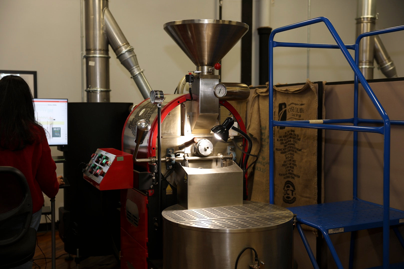 Small-batch coffee roasting on a mill city roaster at Origin Hill Coffee Roasters in Toronto