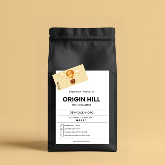 Brazilian coffee by Deyvid Leandro, Red Catuai varietal, roasted in Toronto by Origin Hill Coffee Roasters. Notes of chocolate, caramel, and nuts.